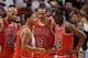 Oct 29, 2013; Miami, FL, USA; Chicago Bulls point guard Derrick Rose (center) talks with power forward Taj Gibson (second from left) center Joakim Noah (13) and small forward Tony Snell (right) during a game against the Miami Heat at American Airlines Ar
