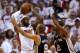 MIAMI, FL - JUNE 20: LeBron James #6 of the Miami Heat looks to pass against Tony Parker #9 and Kawhi Leonard #2 of the San Antonio Spurs in the third quarter during Game Seven of the 2013 NBA Finals at AmericanAirlines Arena on June 20, 2013 in Miami, F