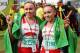 DURBAN, SOUTH AFRICA - 24 MAY: Olesya Nurgalieva (L) of Russia celebrates with sister Elena Nurgalieva of Russia after their respective first and second places in the Comrades Marathon women's race between Durban and Pietermaritzburg on May 24, 2009 in D