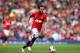 MANCHESTER, ENGLAND - MAY 03: Juan Mata of Manchester United runs with the ball during the Barclays Premier League match between Manchester United and Sunderland at Old Trafford on May 3, 2014 in Manchester, England. (Photo by Shaun Botterill/Getty Imag