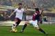 BOLOGNA, ITALY - FEBRUARY 23:Miralem Pjanic # 16 of AS Roma ( L ) competes the ball with Archimede Morleo # 3 of Bologna FC ( R ) during the Serie A match between Bologna FC and AS Roma at Stadio Renato Dall'Ara on February 23, 2014 in Bologna, Italy. (