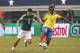 ARLINGTON, TX - MAY 31: Edison Mendez #8 of Ecuador advances the ball against Oribe Peralta #19 of Mexico during an international friendly match at the AT&T Stadium on May 31, 2014 in Arlington, Texas. (Photo by Chris Covatta/Getty Images)