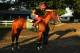 ELMONT, NY - MAY 30: Kentucky Derby and Preakness winner California Chrome with exercise rider Willie Delgado up, heads to the main track for morning training at Belmont Park on May 30, 2014 in Elmont, New York. He is scheduled to race for the Triple Cro