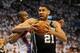 May 31, 2014; Oklahoma City, OK, USA; San Antonio Spurs forward Tim Duncan (21) drives to the basket against Oklahoma City Thunder forward Serge Ibaka (9) during the fourth quarter in game six of the Western Conference Finals of the 2014 NBA Playoffs at C