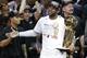 Jun 20, 2013; Miami, FL, USA; Miami Heat guard LeBron James celebrates with the Larry O' Brien Championship trophy after game seven in the 2013 NBA Finals at American Airlines Arena. Miami defeated the San Antonio Spurs 95-88 to win the NBA Championship.
