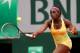PARIS, FRANCE - MAY 29: Sloane Stephens of the United States returns a shot during her women's singles match against Polona Hercog of Slovenia on day five of the French Open at Roland Garros on May 29, 2014 in Paris, France. (Photo by Matthew Stockman/G
