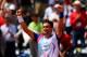 PARIS, FRANCE - MAY 31: David Ferrer of Spain celebrates victory in his men's singles match against Andreas Seppi of Italy on day seven of the French Open at Roland Garros on May 31, 2014 in Paris, France. (Photo by Clive Brunskill/Getty Images)