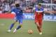 May 27, 2014; San Francisco, CA, USA; Azerbaijan forward Rauf Aliyev (11) and United States defender Matt Besler (5) fight for the ball during the first half at Candlestick Park. Mandatory Credit: Kyle Terada-USA TODAY Sports