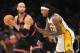 February 9, 2014; Los Angeles, CA, USA; Chicago Bulls power forward Taj Gibson (22) controls the ball against Los Angeles Lakers power forward Jordan Hill (27) during the second half at Staples Center. Mandatory Credit: Gary A. Vasquez-USA TODAY Sports