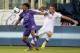 FLORENCE, ITALY - APRIL 19: Guillermo Cuadrado of ACF Fiorentina fights for the ball with Rafael Toloi of AS Roma during the Serie A match between ACF Fiorentina and AS Roma at Stadio Artemio Franchi on April 19, 2014 in Florence, Italy. (Photo by Gabrie