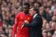 LIVERPOOL, ENGLAND - MARCH 30: Liverpool Manager Brendan Rodgers speaks to Daniel Sturridge during the Barclays Premier League match between Liverpool and Tottenham Hotspur at Anfield on March 30, 2014 in Liverpool, England. (Photo by Alex Livesey/Getty