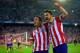 MADRID, SPAIN - APRIL 09: Koke of Club Atletico de Madrid celebrates scoring the opening goal with David Villa of Club Atletico de Madrid during the UEFA Champions League Quarter Final second leg match between Club Atletico de Madrid and FC Barcelona at