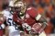 Jan 6, 2014; Pasadena, CA, USA; Florida State Seminoles running back Karlos Williams (9) runs with the ball during the game against the Auburn Tigers for the 2014 BCS National Championship game at the Rose Bowl. Mandatory Credit: Matthew Emmons-USA TODAY