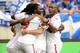 Jul 8, 2013; Harrison, NJ, USA; Trinidad and Tobago forward Trinidad and Tobago midfielder Keon Daniel (19) celebrates his goal with teammates during the first half at Red Bull Arena. Mandatory Credit: Joe Camporeale-USA TODAY Sports