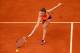 PARIS, FRANCE - JUNE 02: Simona Halep of Romania returns a shot during her women's singles match against Sloane Stephens of the United States on day nine of the French Open at Roland Garros on June 2, 2014 in Paris, France. (Photo by Clive Brunskill/Ge