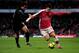 LONDON, ENGLAND - JANUARY 31: Cesc Fabregas of Arsenal battles for the ball with Rafael of Manchester United during the Barclays Premier League match between Arsenal and Manchester United at The Emirates Stadium on January 31, 2010 in London, England. (