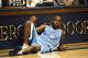 27 Jan 1999: Ed Cota #5 of the North Carolina Tar Heels waits on the floor during the game against the Duke Blue Devils at the Camron Indoor Stadium in Durham, North Carolina.The Blue Devils defeated the Tar Heels 89-77. Mandatory Credit: Craig Jones /