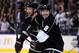 LOS ANGELES, CA - MARCH 29: Drew Doughty #8 and Jake Muzzin #6 of the Los Angeles Kings celebrate after tyler Toffoli's third period goal against the Winnipeg Jets at Staples Center on March 29, 2014 in Los Angeles, California. The Kings won 4-2. (Phot
