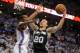 May 31, 2014; Oklahoma City, OK, USA; San Antonio Spurs guard Manu Ginobili (20) drives to the basket against Oklahoma City Thunder forward Kevin Durant (35) during the fourth quarter in game six of the Western Conference Finals of the 2014 NBA Playoffs a