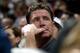 MIAMI - JANUARY 30: Former Miami Dolphin quarterback Dan Marino watches the game between the Miami Heat and the Houston Rockets on January 30, 2005 at American Airlines Arena in Miami, Florida. The heat defeated the Rockets 104-95. NOTE TO USER: User ex