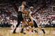 MIAMI, FL - JUNE 09: Tony Parker #9 of the San Antonio Spurs uses a screen from Tim Duncan #21 to get around LeBron James #6 of the Miami Heat in the third quarter during Game Two of the 2013 NBA Finals at AmericanAirlines Arena on June 9, 2013 in Miami,