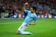 LONDON, ENGLAND - MARCH 02: Jesus Navas of Manchester City celebrates after scoring his team's third goal during the Capital One Cup Final between Manchester City and Sunderland at Wembley Stadium on March 2, 2014 in London, England. (Photo by Jamie Mc