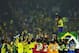 YOKOHAMA - JUNE 30: Cafu on the podium celebrates with the World Cup trophy after the World Cup Final match against Germany played at the International Stadium Yokohama, Yokohama, Japan on June 30, 2002. Brazil won the match 2-0. (Photo by Shaun Botteri