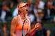 PARIS, FRANCE - JUNE 03: Maria Sharapova of Russia celebrates a point during her women's singles match against Garbine Muguruza of Spain on day ten of the French Open at Roland Garros on June 3, 2014 in Paris, France. (Photo by Clive Brunskill/Getty Ima