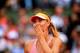 PARIS, FRANCE - JUNE 03: Maria Sharapova of Russia celebrates victory during her women's singles match against Garbine Muguruza of Spain on day ten of the French Open at Roland Garros on June 3, 2014 in Paris, France. (Photo by Clive Brunskill/Getty Ima