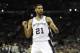 May 4, 2014; San Antonio, TX, USA; San Antonio Spurs forward Tim Duncan (21) reacts against the Dallas Mavericks in game seven of the first round of the 2014 NBA Playoffs at AT&T Center. San Antonio beat Dallas 119-96.Mandatory Credit: Brendan Maloney-USA