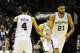 May 4, 2014; San Antonio, TX, USA; San Antonio Spurs forward Tim Duncan (21) and guard Danny Green (4) react against the Dallas Mavericks in game seven of the first round of the 2014 NBA Playoffs at AT&T Center. Mandatory Credit: Brendan Maloney-USA TODAY