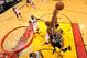 MIAMI, FL - JUNE 20: Tim Duncan #21 of the San Antonio Spurs attempts a shot against Chris Bosh #1 of the Miami Heat during Game Seven of the 2013 NBA Finals on June 20, 2013 at the American Airlines Arena in Miami, Florida. NOTE TO USER: User expressly a