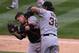 DENVER, CO - MAY 22: Catcher Buster Posey #28 of the San Francisco Giants collides with first baseman Michael Morse #38 of the San Francisco Giants as Posey catches a pop foul by Justin Morneau #33 of the Colorado Rockies to end the fourth inning at Coor