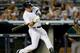 NEW YORK, NY - JUNE 03: Mark Teixeira #25 of the New York Yankees hits an RBI single in the first inning against the Oakland Athletics on June 3, 2014 at Yankee Stadium in the Bronx borough of New York City. (Photo by Elsa/Getty Images)