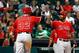 HOUSTON, TX - JUNE 03: Josh Hamilton #32 of the Los Angeles Angels of Anaheim is greeted at the plate by teammate Howie Kendrick #47 after Hamilton hit a solo home run in the eighth inning off Tony Sipp #29 of the Houston Astros at Minute Maid Park on J