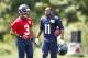 May 27, 2014; Renton, WA, USA; Seattle Seahawks quarterback Russell Wilson (3) talks with wide receiver Percy Harvin (11) during organized team activities at the Virginia Mason Athletic Center. Mandatory Credit: Joe Nicholson-USA TODAY Sports