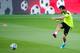 SEVILLE, SPAIN - MAY 29: Cesc Fabregas of Spain shoots towards goal during a training session ahead of their international friendly match against Bolivia at the Ramon Sanchez Pizjuan stadium on May 29, 2014 in Seville, Spain. (Photo by David Ramos/Getty