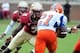 Sept 8, 2012; Tallahassee, Florida, USA; Florida State Seminoles linebacker Christian Jones (7) prepares to tackle Savannah State Tigers running back Sheldon Barnes (21) during the first half of the game at Doak Campbell Stadium. Mandatory Credit: Melina