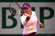 PARIS, FRANCE - JUNE 04: Simona Halep of Romania returns a shot during her women's singles quarter-final match against Svetlana Kuznetsova of Russia on day eleven of the French Open at Roland Garros on June 4, 2014 in Paris, France. (Photo by Dan Istite
