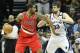 Jan 4, 2013; Memphis, TN, USA; Portland Trail Blazers forward LaMarcus Aldridge (12) drives against Memphis Grizzlies center Marc Gasol (33) at the FedEx Forum. Portland defeated Memphis 86-84. Mandatory Credit: Nelson Chenault-USA TODAY Sports