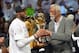 Jun 20, 2013; Miami, FL, USA; NBA great Bill Russell presents the MVP trophy to Miami Heat small forward LeBron James (6) after defeating the San Antonio Spurs in game seven in the 2013 NBA Finals at American Airlines Arena. Miami Heat won 95-88 to win th