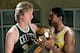 LOS ANGELES - 1986: Larry Bird #33 of the Boston Celtics poses for a portrait with Magic Johnson of the Los Angeles Lakers with each holding the NBA Championship Trophy at The Great Western Forum in Los Angeles, California. NOTE TO USER: User expressly