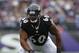 Oct 13, 2013; Baltimore, MD, USA; Baltimore Ravens tackle Eugene Monroe (60) in action against the Green Bay Packers at M&T Bank Stadium. Mandatory Credit: Mitch Stringer-USA TODAY Sports