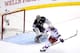 LOS ANGELES, CA - JUNE 04: Benoit Pouliot #67 of the New York Rangers scores a first period goal against goaltender Jonathan Quick #32 of the Los Angeles Kings in the first period during Game One of the 2014 NHL Stanley Cup Final at the Staples Center on