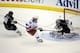 Jun 4, 2014; Los Angeles, CA, USA; New York Rangers left wing Carl Hagelin (62) scores a short-handed goal past Los Angeles Kings goalie Jonathan Quick (32) and defenseman Slava Voynov (26) in the first period during game one of the 2014 Stanley Cup Final