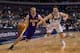 Nov 5, 2013; Dallas, TX, USA; Los Angeles Lakers point guard Steve Blake (5) drives to the basket past Dallas Mavericks point guard Gal Mekel (33) during the game at the American Airlines Center. The Mavericks defeated the Lakers 123-104. Mandatory Credi