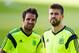 SEVILLE, SPAIN - MAY 29: Cesc Fabregas (L) and Gerard Pique of Spain look on during a training session ahead of their international friendly match against Bolivia at the Ramon Sanchez Pizjuan stadium on May 29, 2014 in Seville, Spain. (Photo by David Ra