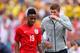 MIAMI GARDENS, FL - JUNE 04: Steven Gerrard of England speaks with Raheem Sterling of England after he was shown a red card during the International friendly match between England and Ecuador at Sun Life Stadium on June 4, 2014 in Miami Gardens, Florida