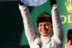 MELBOURNE, AUSTRALIA - MARCH 16: Kevin Magnussen of Denmark and McLaren celebrates on the podium after finishing third during the Australian Formula One Grand Prix at Albert Park on March 16, 2014 in Melbourne, Australia. (Photo by Mark Thompson/Getty I