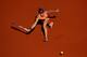 PARIS, FRANCE - JUNE 05: Simona Halep of Romania returns a shot during her women's singles match against Andrea Petkovic of Germany on day twelve of the French Open at Roland Garros on June 5, 2014 in Paris, France. (Photo by Clive Brunskill/Getty Image